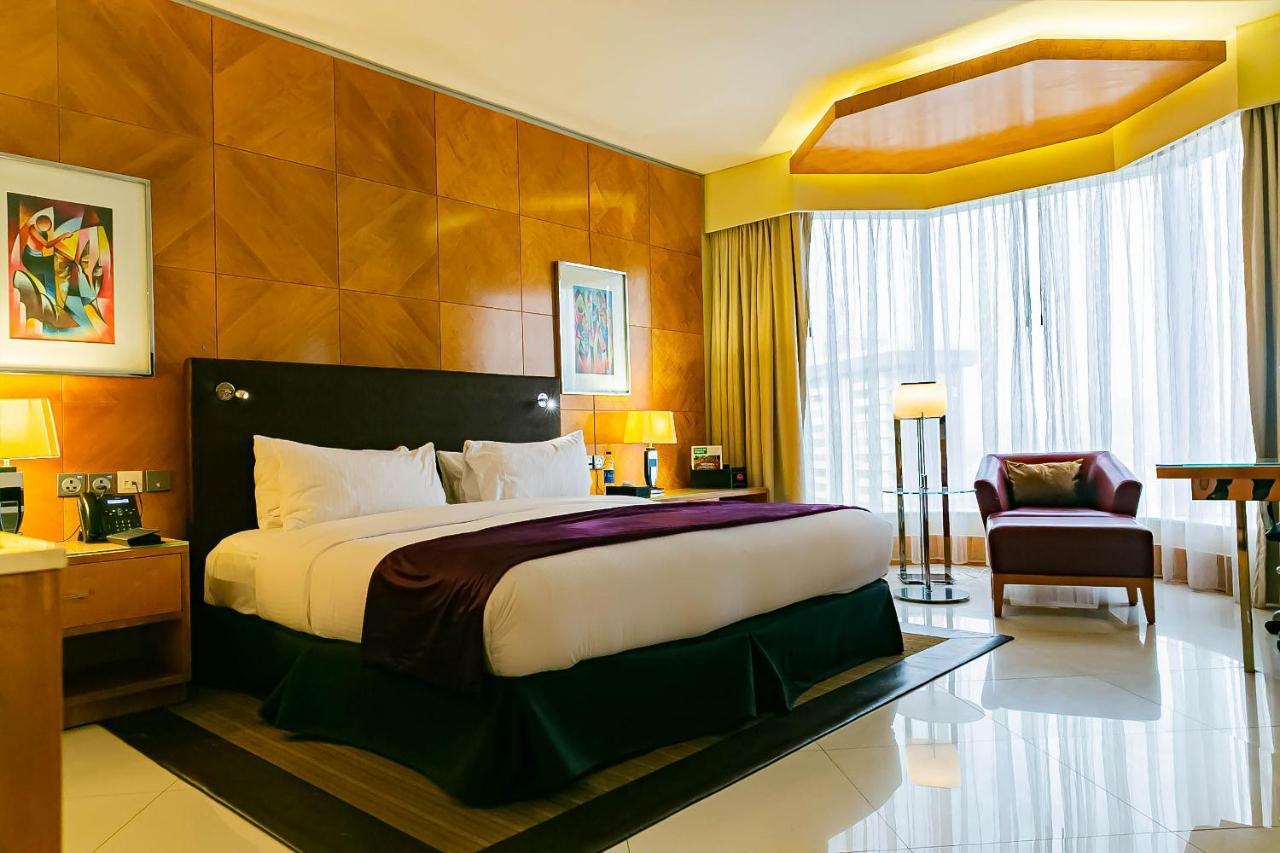 Lagos Continental Hotel Exteriér fotografie A bedroom at the hotel