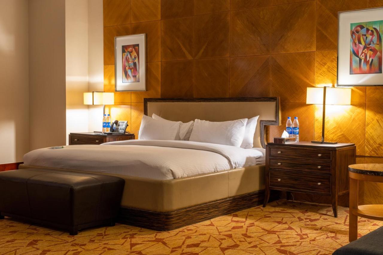 Lagos Continental Hotel Exteriér fotografie A bedroom at the Fairmont